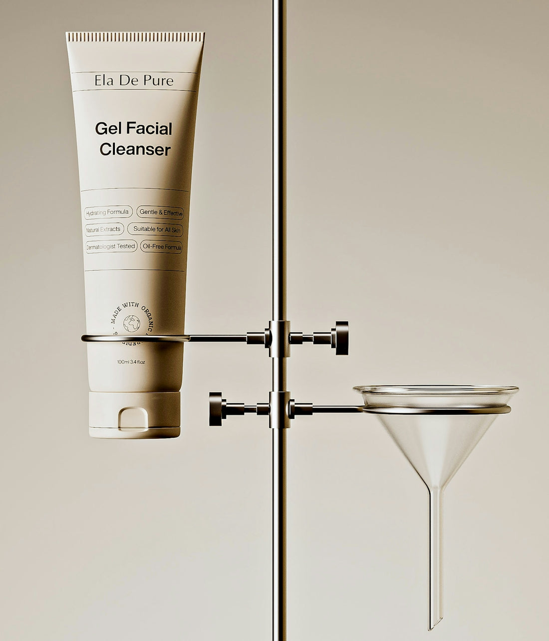 A facial cleanser bottle held on laboratory equipment.