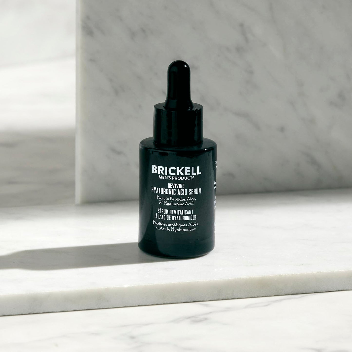 Brickell Men's Anti Aging Hyaluronic Acid Serum for Face, Reviving Day Serum for Men, Natural and Organic with Protein Peptides to Restore Firmness and Collagen, 1 Ounce, Scented